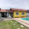 casa amarela na praia da pinheira aluguel temporada com piscina