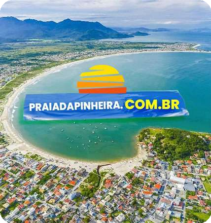 Aerial view of a curved beach with a bright blue banner across the water reading PRAIADAPINHEIRA.COM.BR and a yellow sun logo above it.